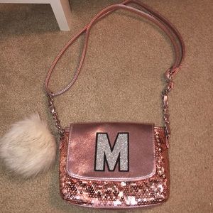 Rose gold "M" purse